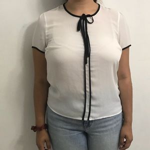white Parisian style blouse